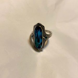 Sterling silver ring…size 7…teal stone